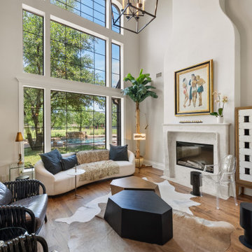 Vaulted Great Room with Floor-to-Ceiling White Stone Fireplace
