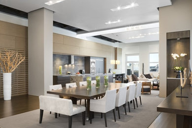 Inspiration for a large contemporary open plan dining in Boston with beige walls, dark hardwood floors and brown floor.