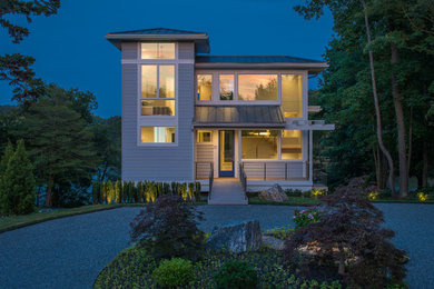 Example of a minimalist three-story house exterior design in Richmond