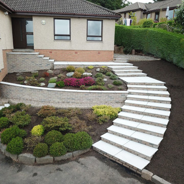 Upgraded steps and terracing at property entrance