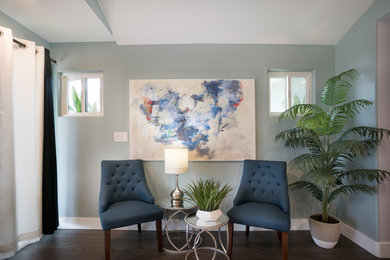 Example of a mid-sized transitional entry hall design in Orange County with blue walls