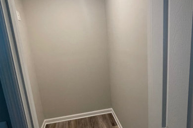 Example of a minimalist closet design in Atlanta