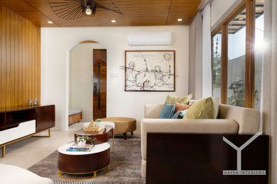 Island style living room photo in Other