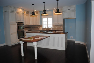 Example of a classic kitchen design in Other