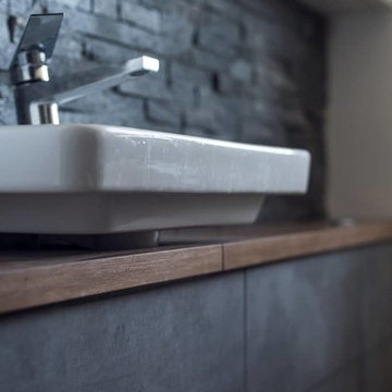 Black bathroom with large window
