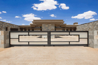 Example of a huge minimalist exterior home design in Phoenix