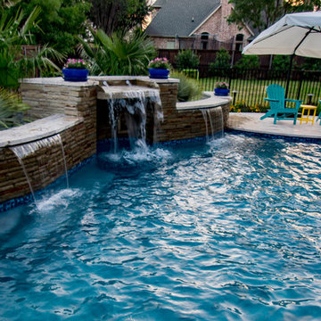 Transitional Curved Pool with Amazing Water Features
