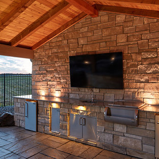 オマハのオーダーメイドおしゃれなプール (天然石敷き) の写真