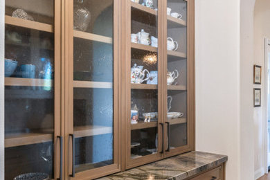 Example of a trendy home bar design in San Diego