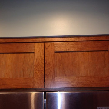 Even though it isn't easy to convert traditional cabinets to a more full overlay