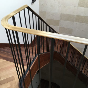 Walnut Stairs with Bronze Handrail and Iron Balusters