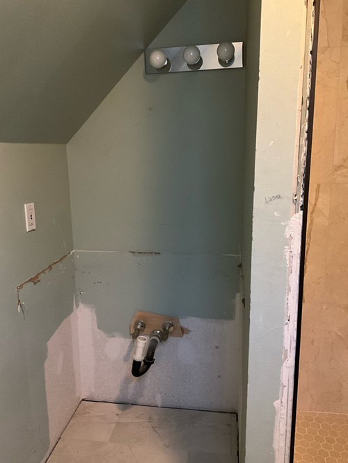 Angled wall over bathroom vanity