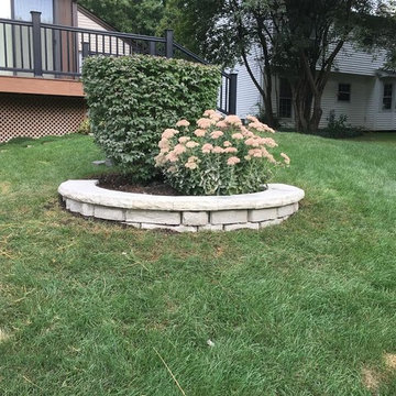 Unilock Beacon Hill flagstone with sandstone coping border