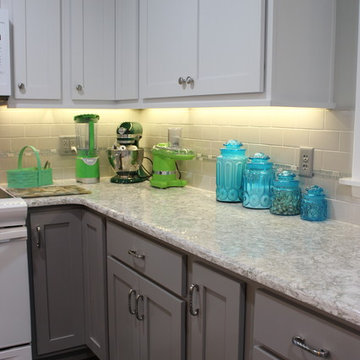 White Upper Cabinet and Gray Base Cabinet Kitchen With Quartz Counters