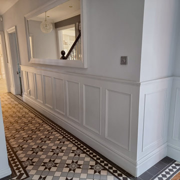 Traditional Hallway renovation with Wall paneling and Victorian tiles