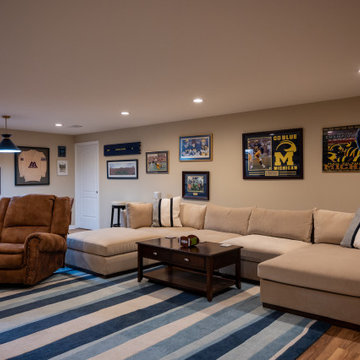 Finished Basement with College Football Theme in Northville, MI