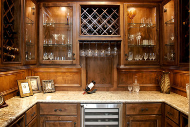Wine cellar - mid-sized traditional wine cellar idea in Houston