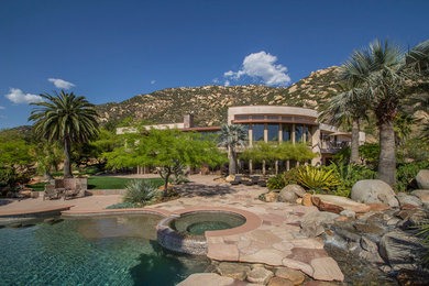 Design ideas for a mediterranean backyard water fountain landscape in San Diego.