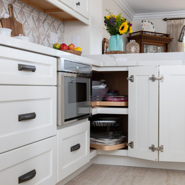 Kitchen remodel with double jointed cabinetry and lazy Susan built-in