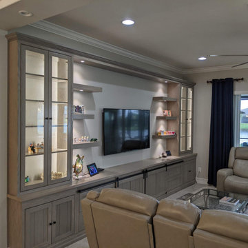 Custom Entertainment Center with Sliding Barn Doors & 6 Floating Shelves