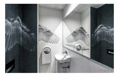 This is an example of a small contemporary powder room in Hanover.