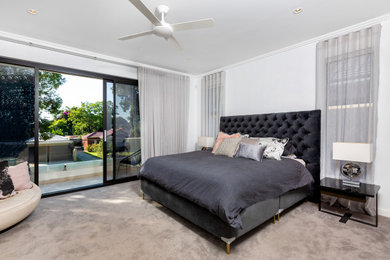 Design ideas for a modern master bedroom in Perth with white walls.