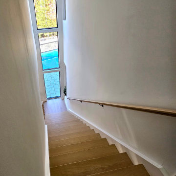 Project #111 | Open-Riser Staircase with Glass Panel Detail