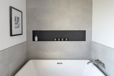 Mid-sized contemporary bathroom in San Francisco with white walls, ceramic floors and grey floor.