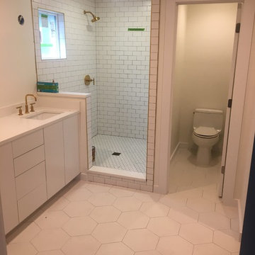 Gold Schluter trim to coordinate with the fixtures. Can't wait to see it complet
