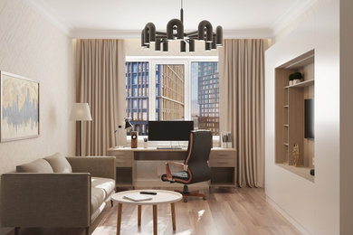 На фото: гостиная комната в современном стиле с бежевыми стенами, полом из ламината, коричневым полом и обоями на стенах с