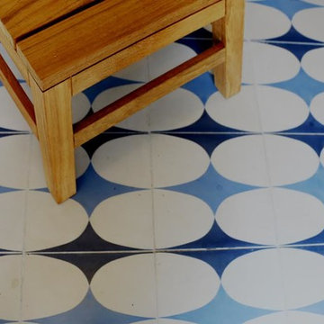 boris aldridge cement tiles add a pop of color and flair to pool bathroom