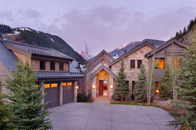 Rustic mixed siding house exterior idea in Denver