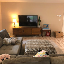 Need help brightening  and cozying up this cold and tiled living room!