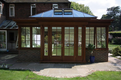 Design ideas for a traditional sunroom in West Midlands.