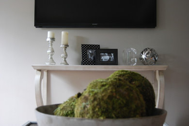 Living room - large modern formal and open concept dark wood floor living room idea in Detroit with gray walls and a wall-mounted tv