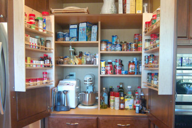 Kitchen - traditional light wood floor kitchen idea in San Luis Obispo with raised-panel cabinets and red cabinets