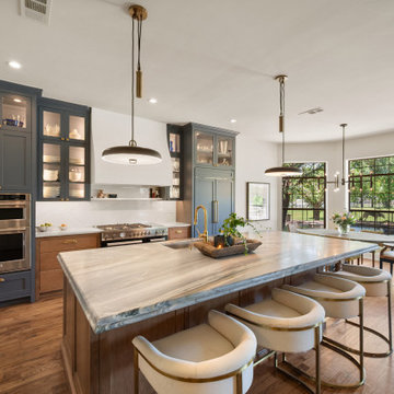 Expansive Great Room with Massive Natural Stone Island and Custom Blue Cabinetry