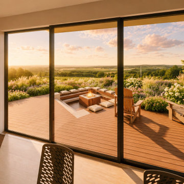 Floor-to-ceiling windows framing the deck, sunken fire pit lounge and valley vie