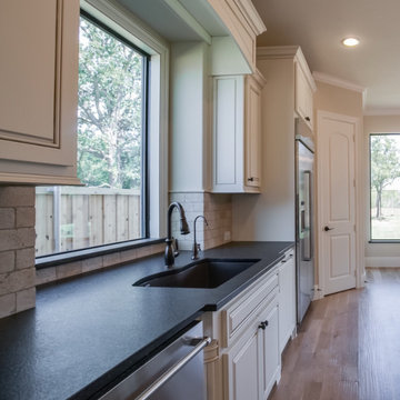 Flower Mound Luxury Kitchen: Leathered Black Granite
