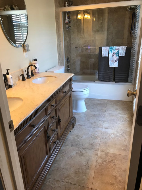 How do I update travertine ceramic tile with gray vanity can I blend