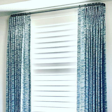Pinch pleat drapery panels on French Return drapery rod.