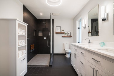 Example of a large transitional master white tile and marble tile porcelain tile and gray floor bathroom design in Other with recessed-panel cabinets, white cabinets, a one-piece toilet, gray walls, an undermount sink and marble countertops