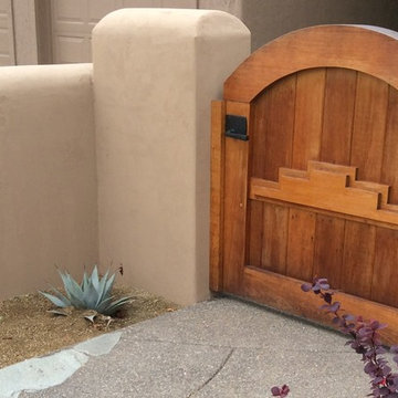 Spanish Style Home Design with Wooden Gate & Dark Bronze Contemporary Gate Latch