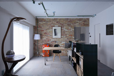 Inspiration for a contemporary home office in Osaka with linoleum floors, a built-in desk and grey floor.