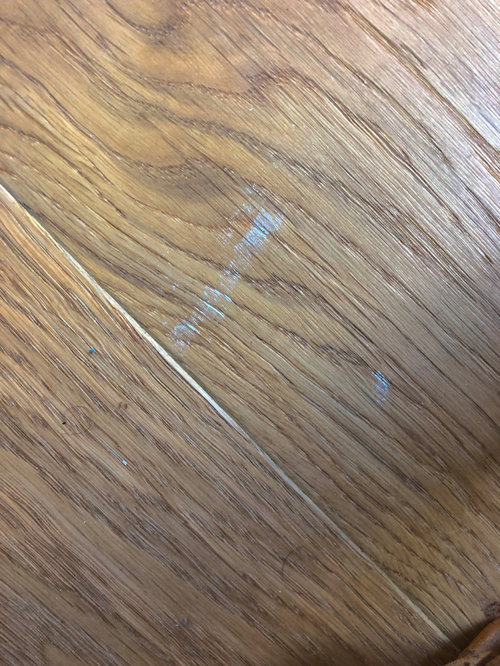 Help! Paint stains in fibrous UV OIL finished wood floors