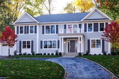 Mid-sized traditional exterior home idea in New York
