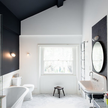 A bathroom with contrast! Contemporary bathroom with traditional undertones.