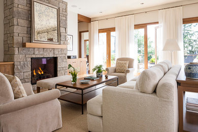 Large contemporary formal open concept living room in Seattle with white walls, light hardwood floors, a standard fireplace, a stone fireplace surround and no tv.