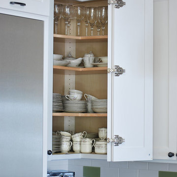 Pie-cut cabinet door open