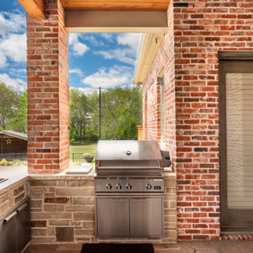 Custom Freestanding Outdoor Living Arbor with Kitchen, Fireplace & Entertainment